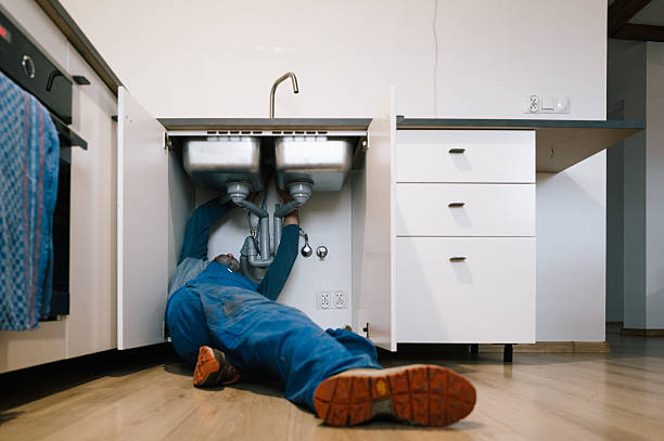 Professional Emergency Plumber technician working in Santiago, MN